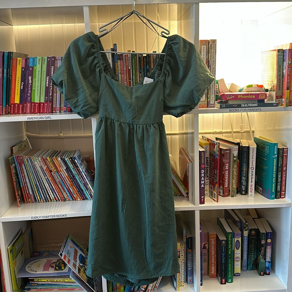 Beautiful sun dress for a 12 year old. Brand new with tags.